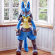 Lucario stands in the corner.